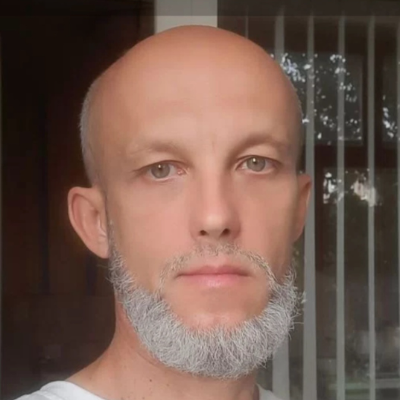 Олег Комизерко